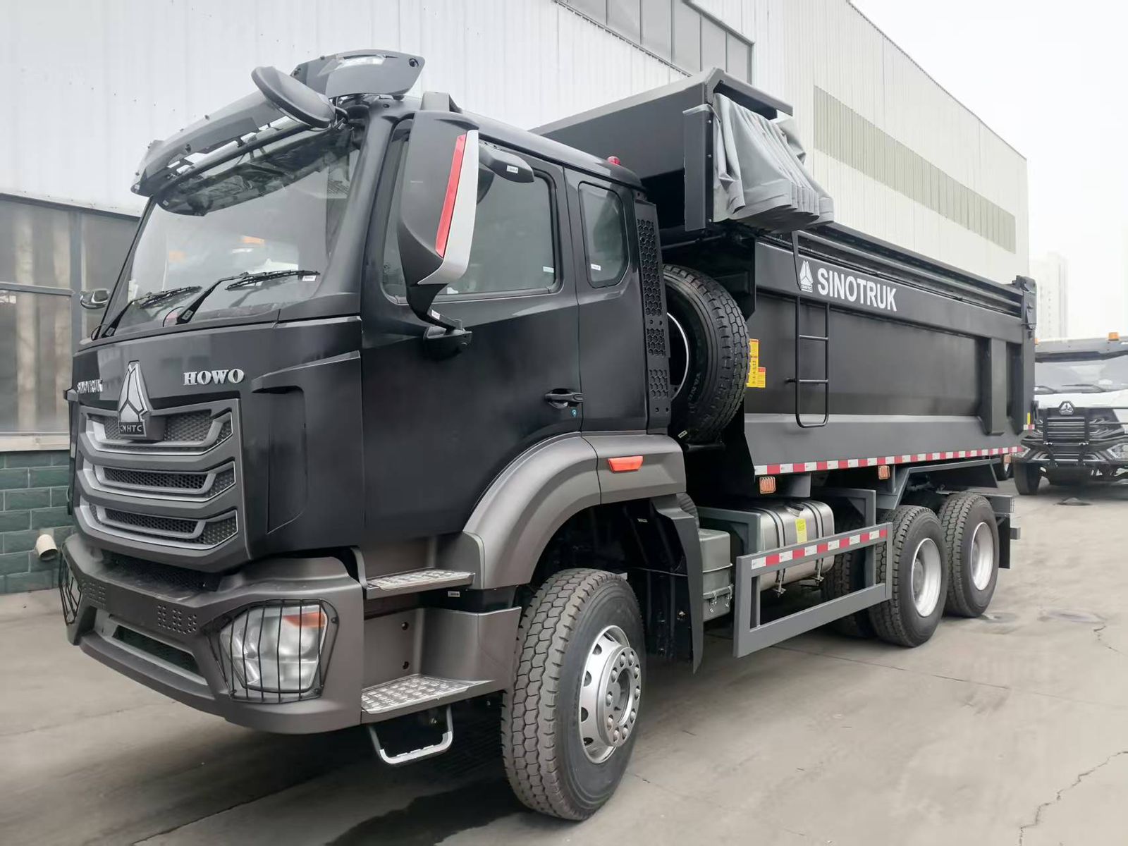 Front three-quarter view of the KBS HOWO Sinotruk 6x4 dump truck