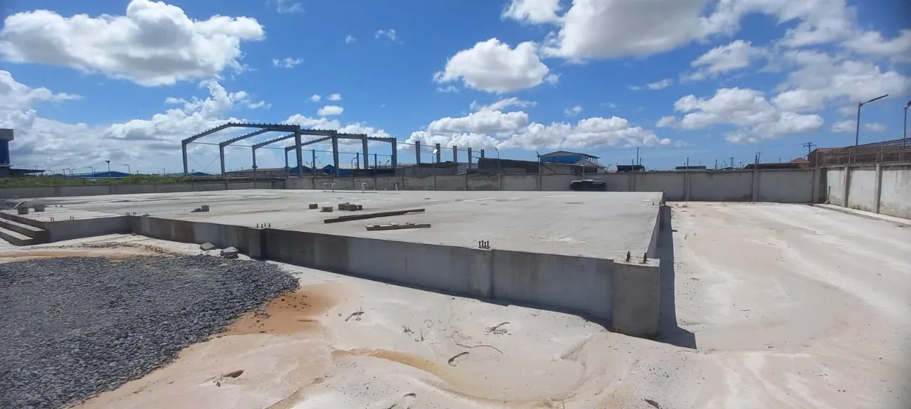 Wide view of the warehouse foundation and steel frame